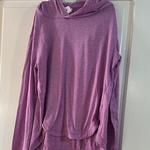 Sportswear top. Super soft short in front and longer in the back.